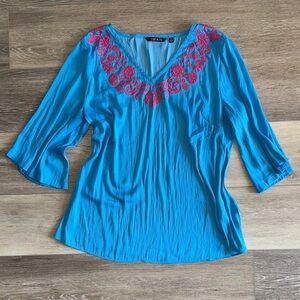 IMAN Graphic Blue Blouse with Relaxed Sleeves NWOT